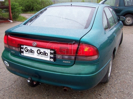 Фаркоп Galia для Mazda 626 (седан, хетчбек) 1992-1997 M015A в 